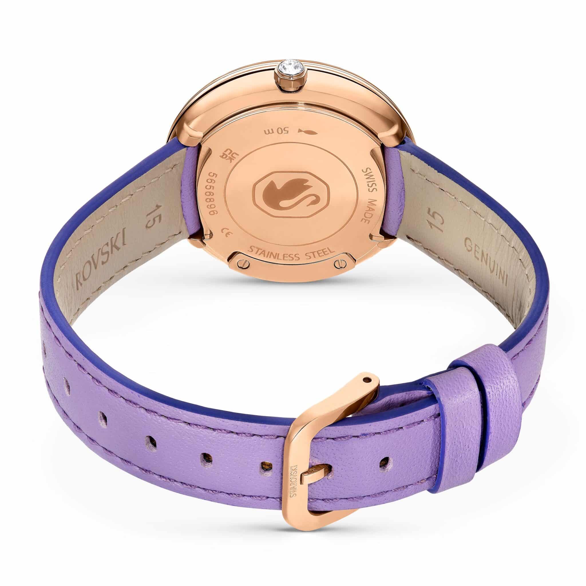 Swarovski Crystalline Lustre Swiss Made watch with purple leather strap and rose gold-tone finish, featuring sparkling crystal accents.