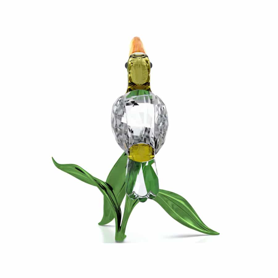 Swarovski Idyllia Toucan figurine with detailed crystal craftsmanship and vibrant colorful accents.