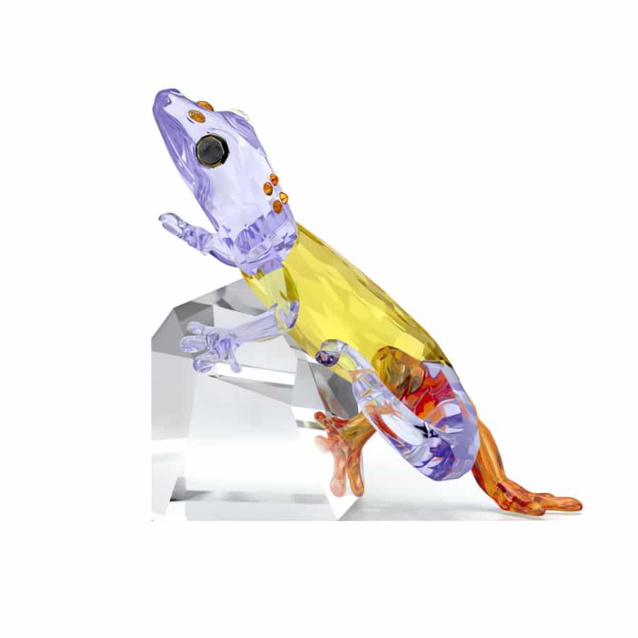 Swarovski Idyllia Gecko crystal figurine with sparkling details and intricate design on a clear base.
